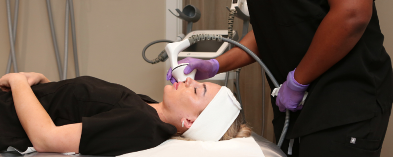 client having face and body contouring treatment